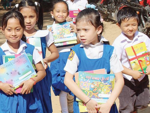 Indigenous students of Bangladesh get books in mother tongue